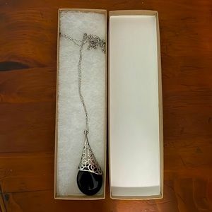 Silver and stone pendant